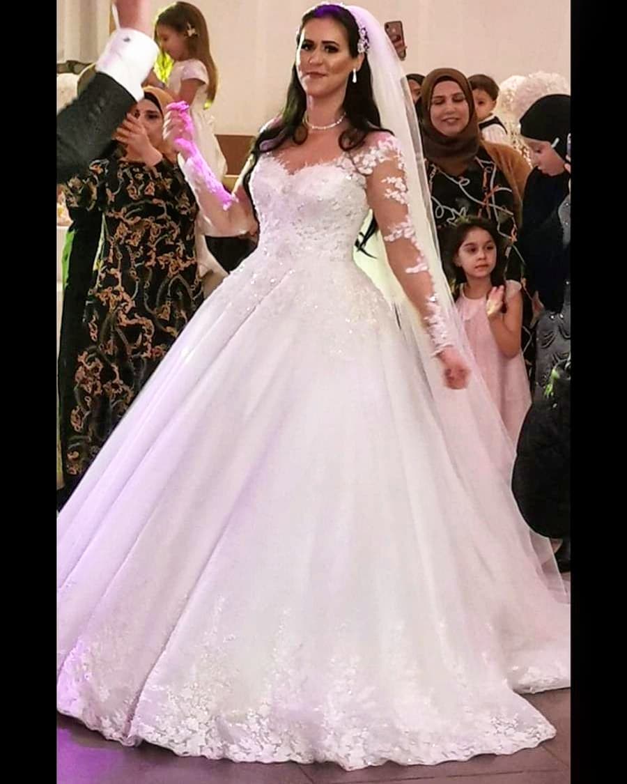 Elegant Long Sleeve Sweetheart Wedding Dress with Appliques Lace Tulle