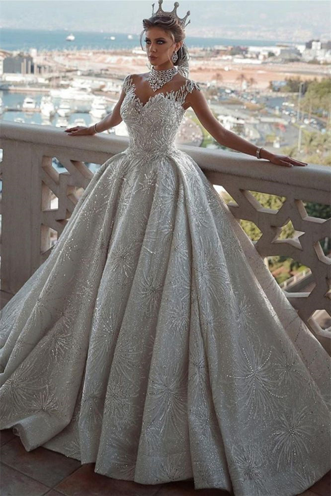 Glamorous Ball Gown Wedding Dress with Cap Sleeves and Beadings