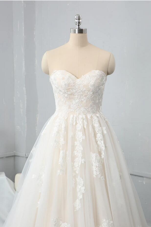 A-Line Wedding Dress With Lace Appliques and Tulle Sweetheart Backless Floor-length Elegance